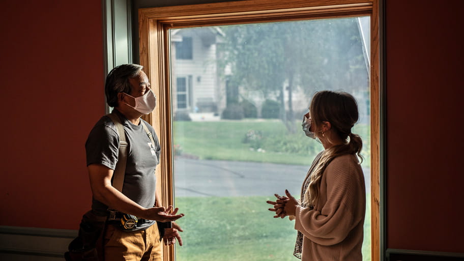 Andersen Windows - Contractor talking to homeowner
