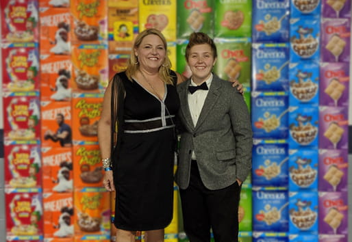 cereal box wall with people standing in front
